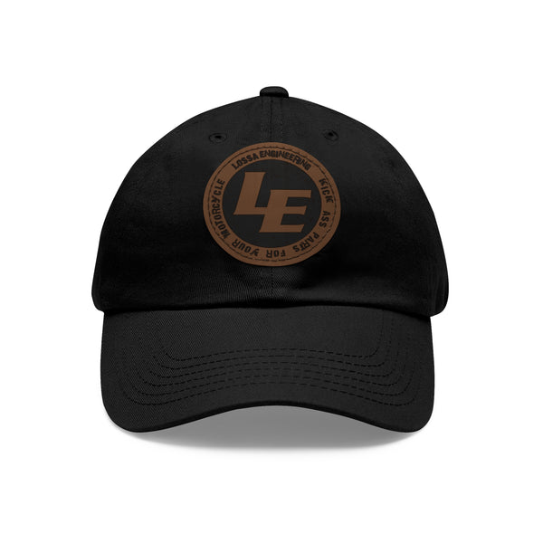Lossa Black cap with a brown logo on a white background